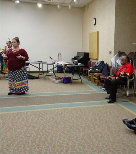 tribal-woman-speaking-to-group-1